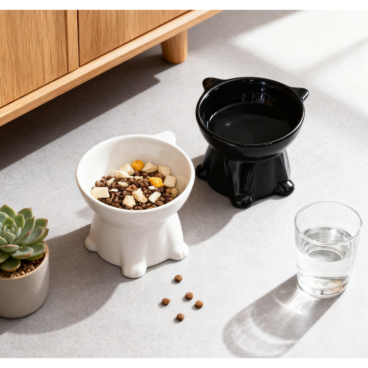 Raised cat bowl set for food and water in a modern kitchen